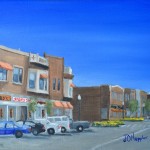 Main Street 9”x12” original oil painting on canvas of cars and store fronts on a small town main street on a summer day.