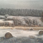 Hay Bales in Snow is a 16 inch by 20 inch original oil painting on canvas of three large round hay bales on a snowy day.